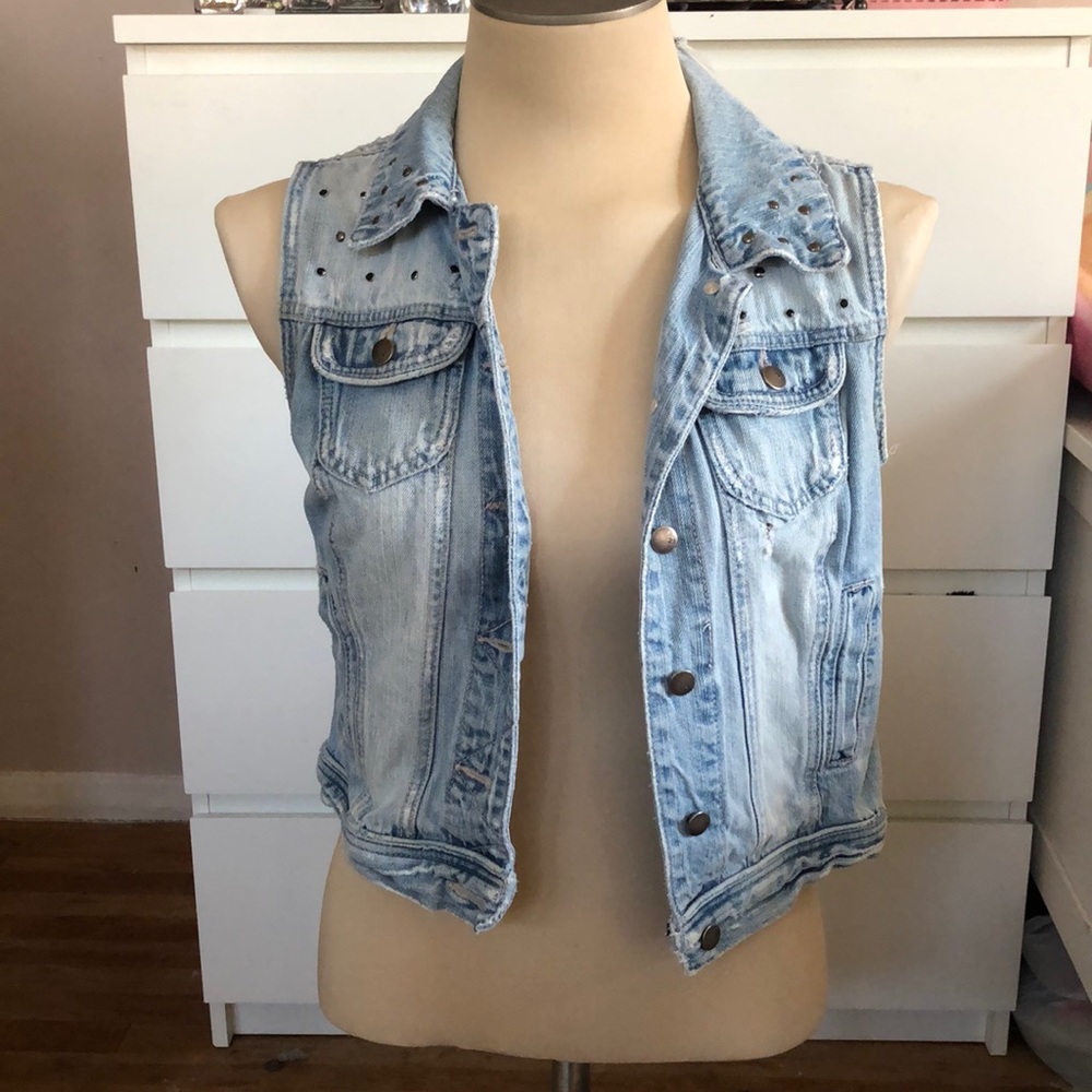 Distressed denim vest